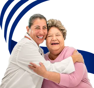 Two people embracing, representing support and care.